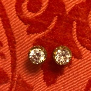 Gold stud earrings